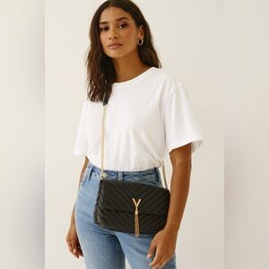 Grossi elegant quilted Crossbody bag. Black color.